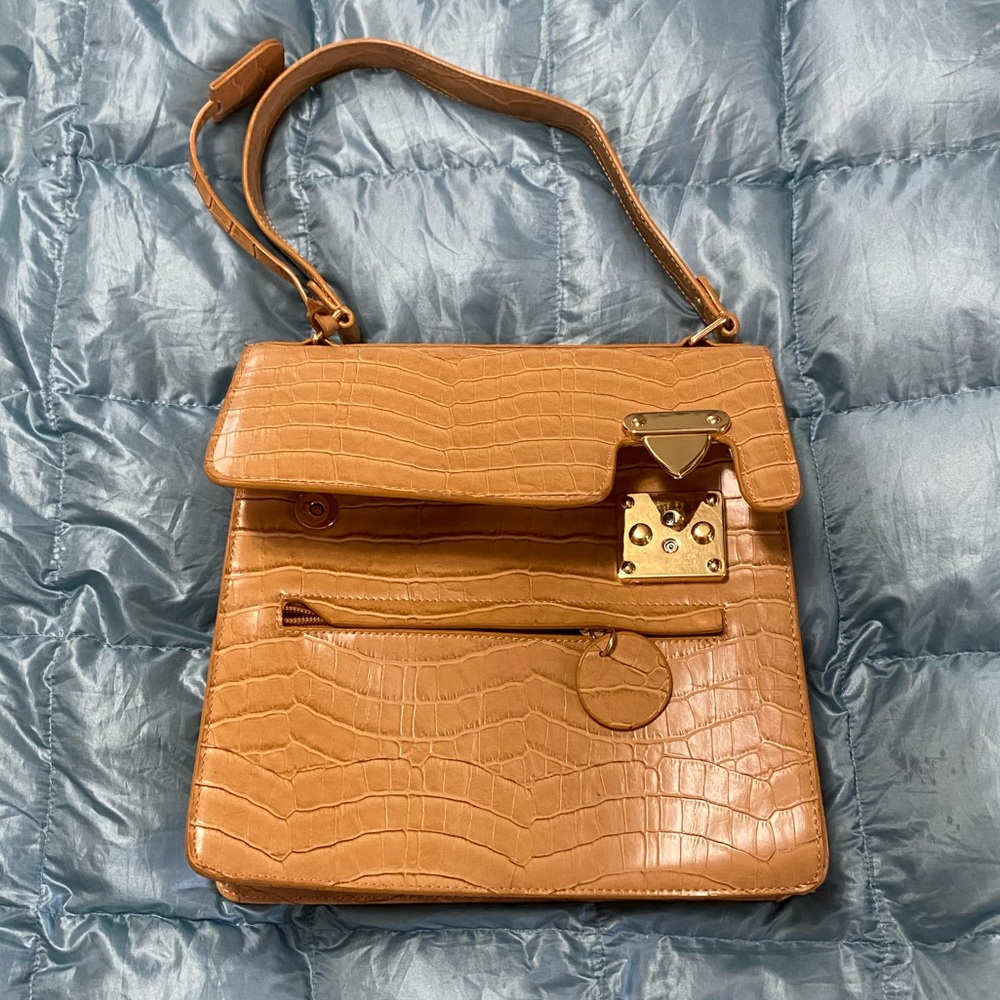 Beautiful NWOT Crocodile Embossed leather hand bag.  Retail $250